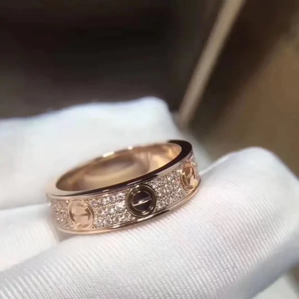 Cartier Love Wedding Ring is Made Of Gold And Set With Diamonds