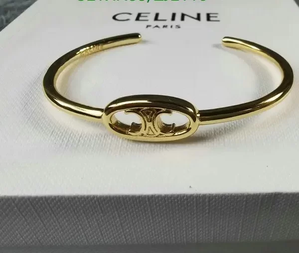 Celine Maillon Triomphe Thin Cuff In Brass With Gold Finish Bracelet