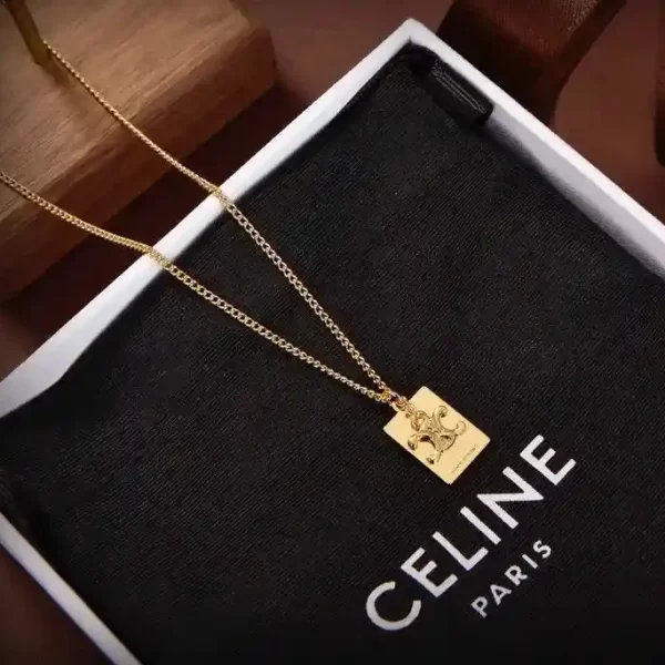 Celine Separables Triomphe Interlocked Pendant In Brass With Gold Finish